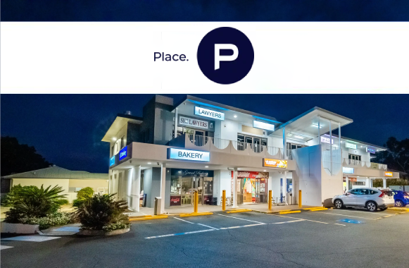 place forest lake logo with west grand place shopping center building behind